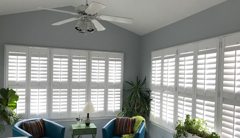 Orlando living room with fan and shutters